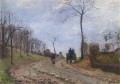 ルーブシエンヌの冬の郊外の田舎道を走る馬車 1872年 カミーユ・ピサロ
